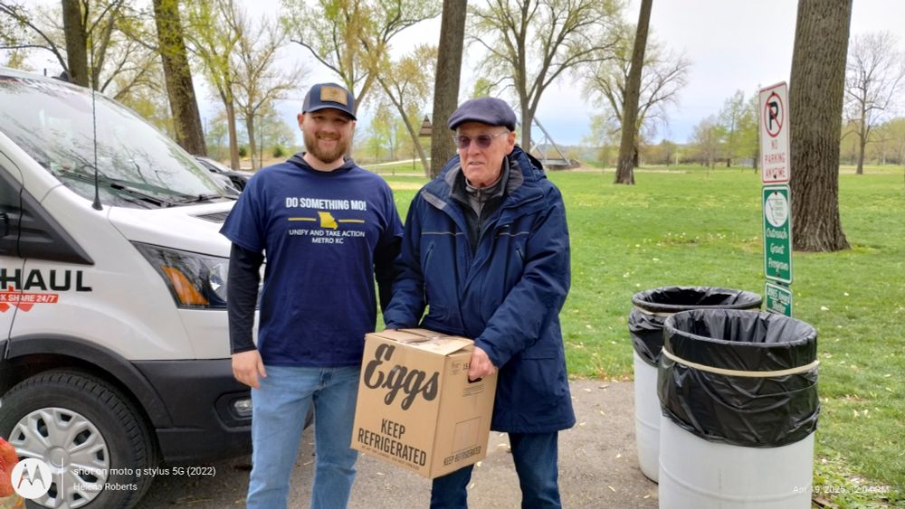 Volunteers loading food. 