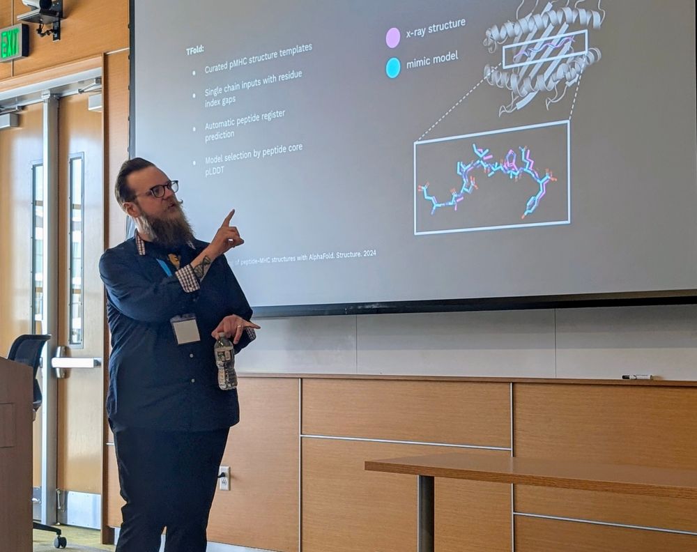 Postdoc Chad Brambley presenting at the AI/HI workshop. 