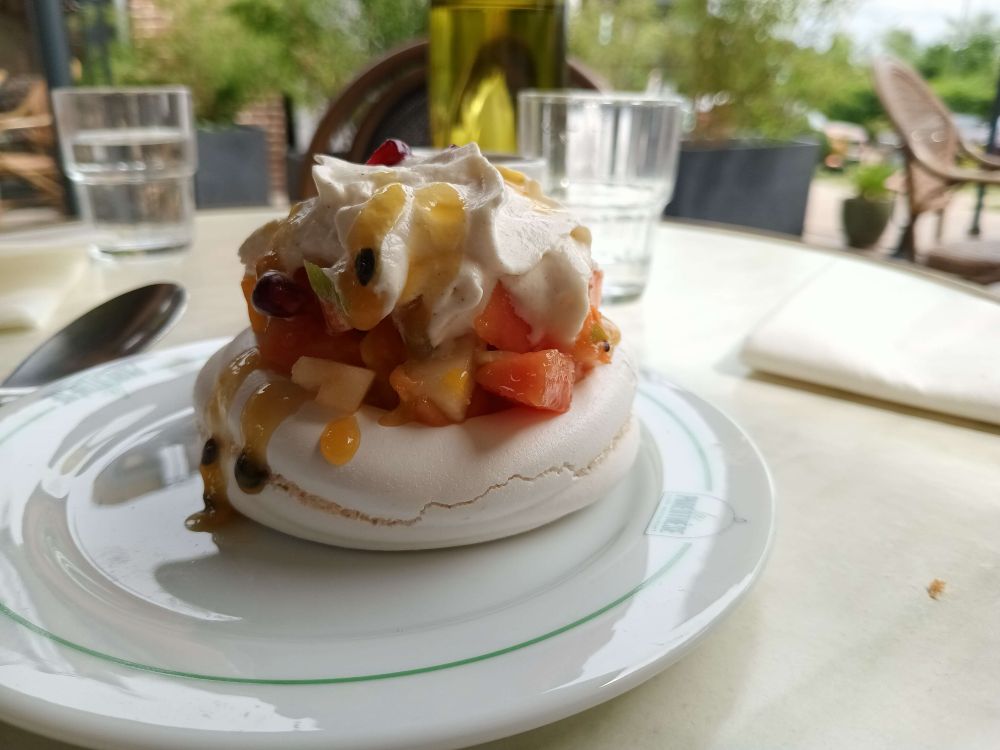 A meringue topped with seasonal fruit