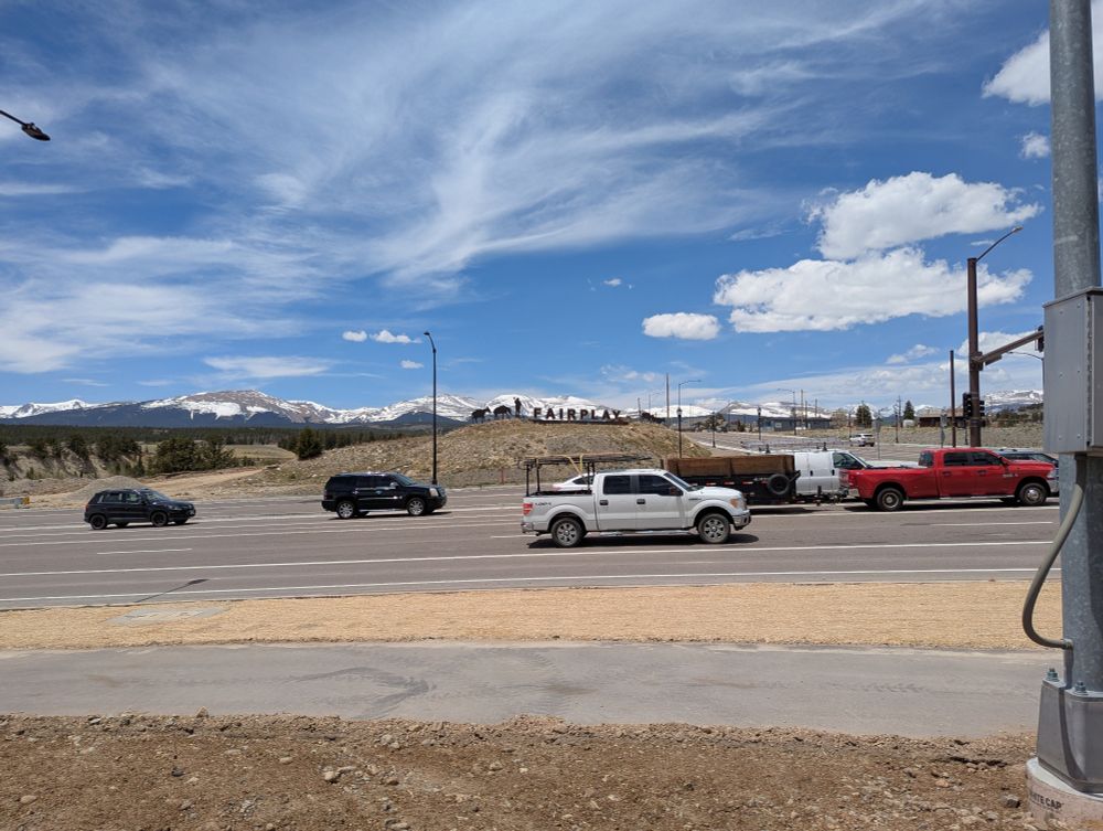 Picture of the Fairplay town, its name written on a small hill.