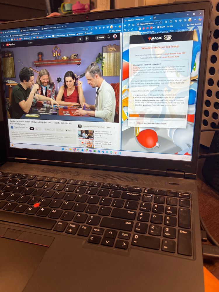 Laptop watching shuffle up and play and waiting in the secret lair queue 