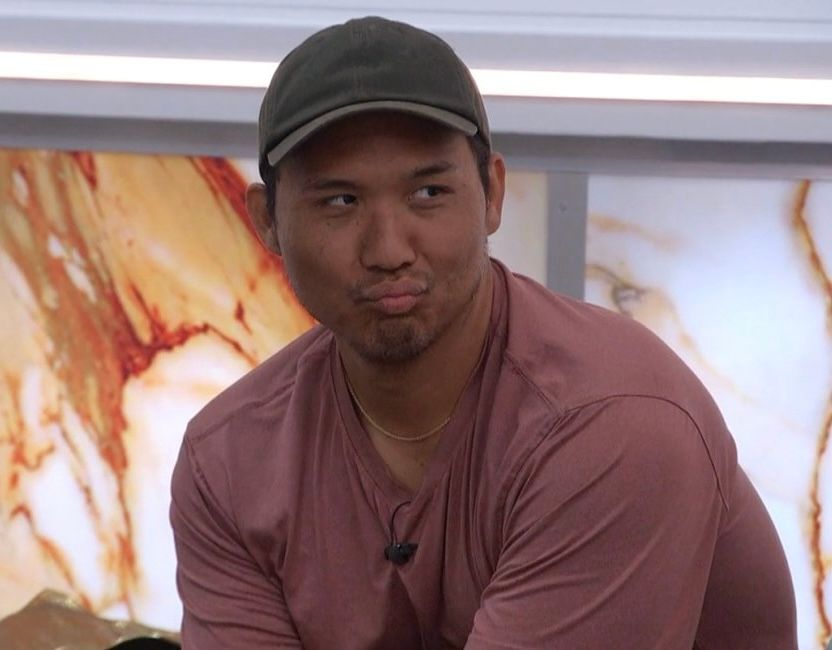 BB26 Kimo looking to the side with pursed lips 