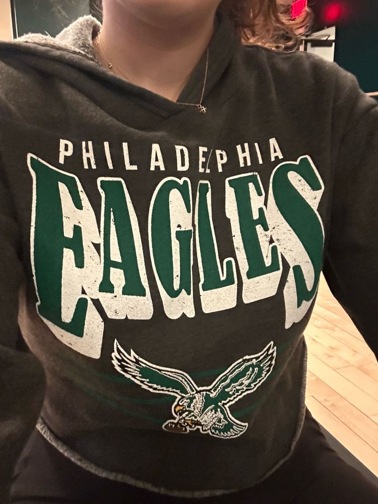A hoodie with “Philadelphia Eagles” text and the throwback Eagles logo 
