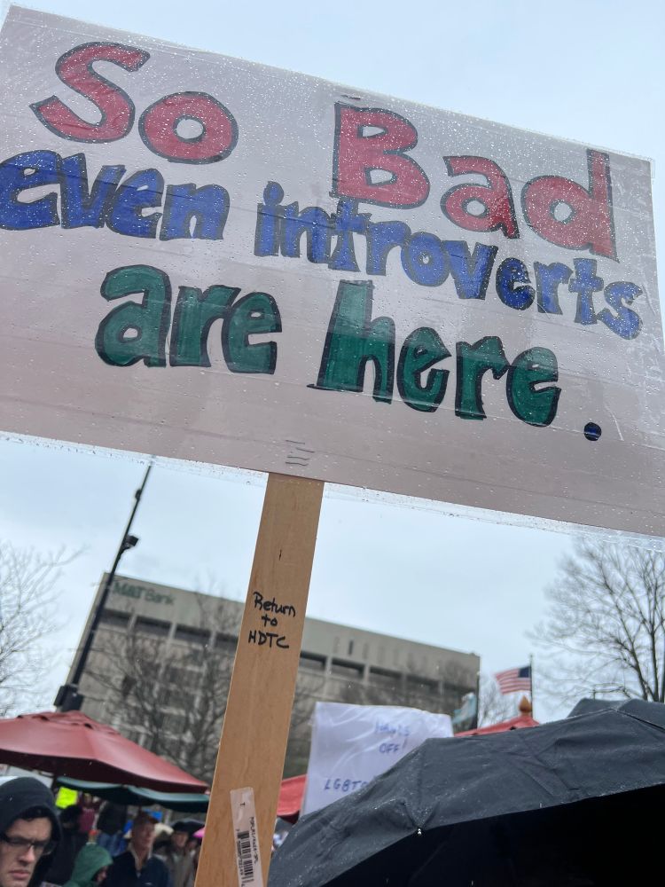 Sign that reads,”So bad even introverts are here.”