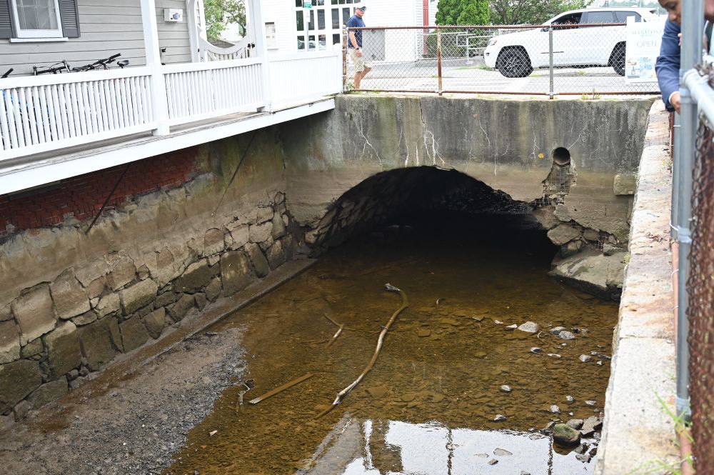 A stone bridge over water.