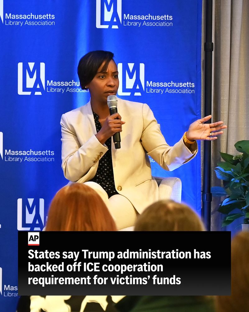 A photo of Attorney General Andrea Joy Campbell holding a microphone while speaking to an audience. A headline clipped from an Associated Press article at the bottom of the graphic reads, "States say Trump administration has backed off ICE cooperation requirement for victims' funds"