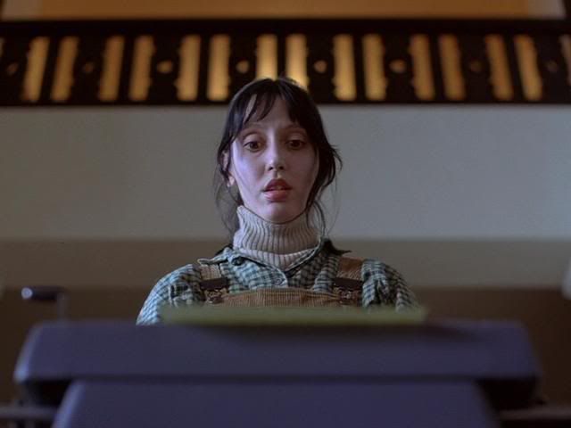 Shelley Duvall in the shining typewriter scene looking down at the manuscript 