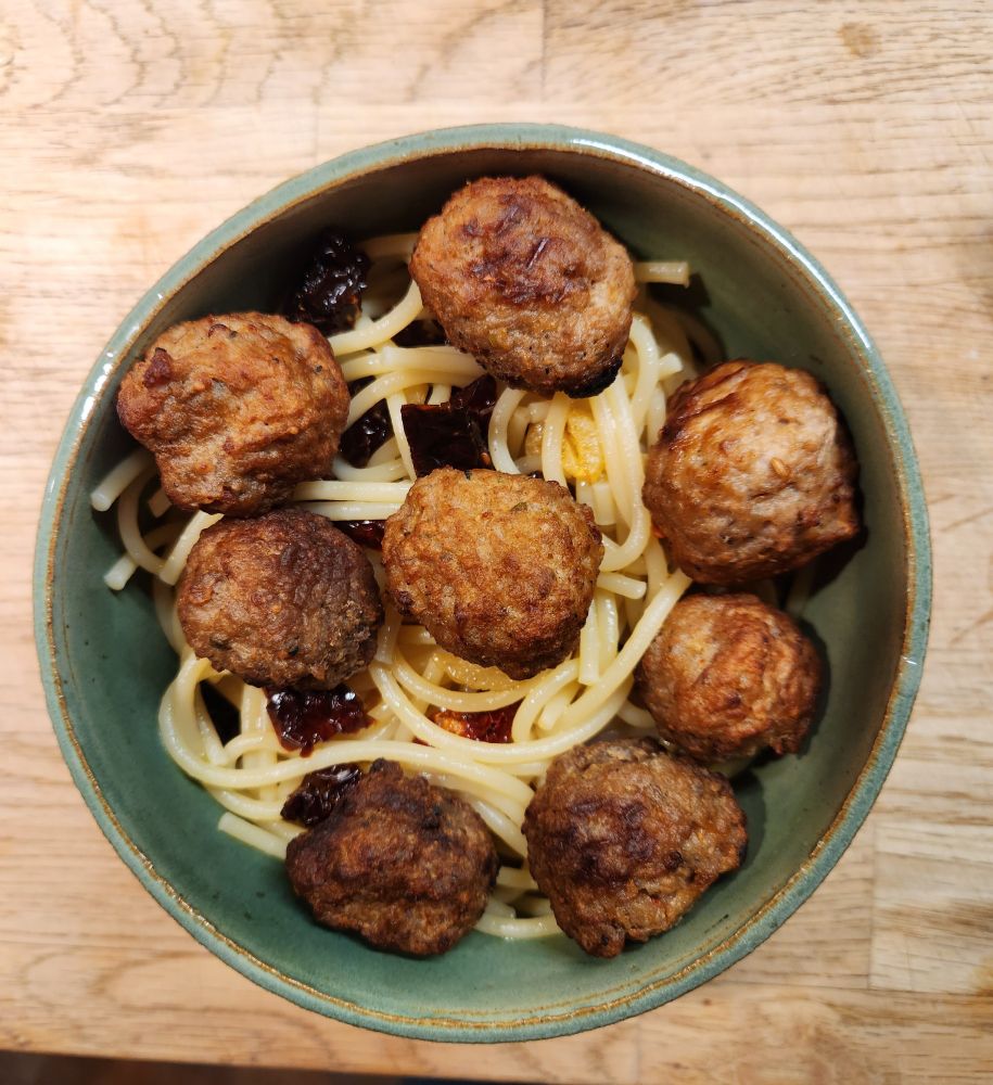 Overheadshot of the meal described in the post. In a green bowl that my mom made in our pottery class