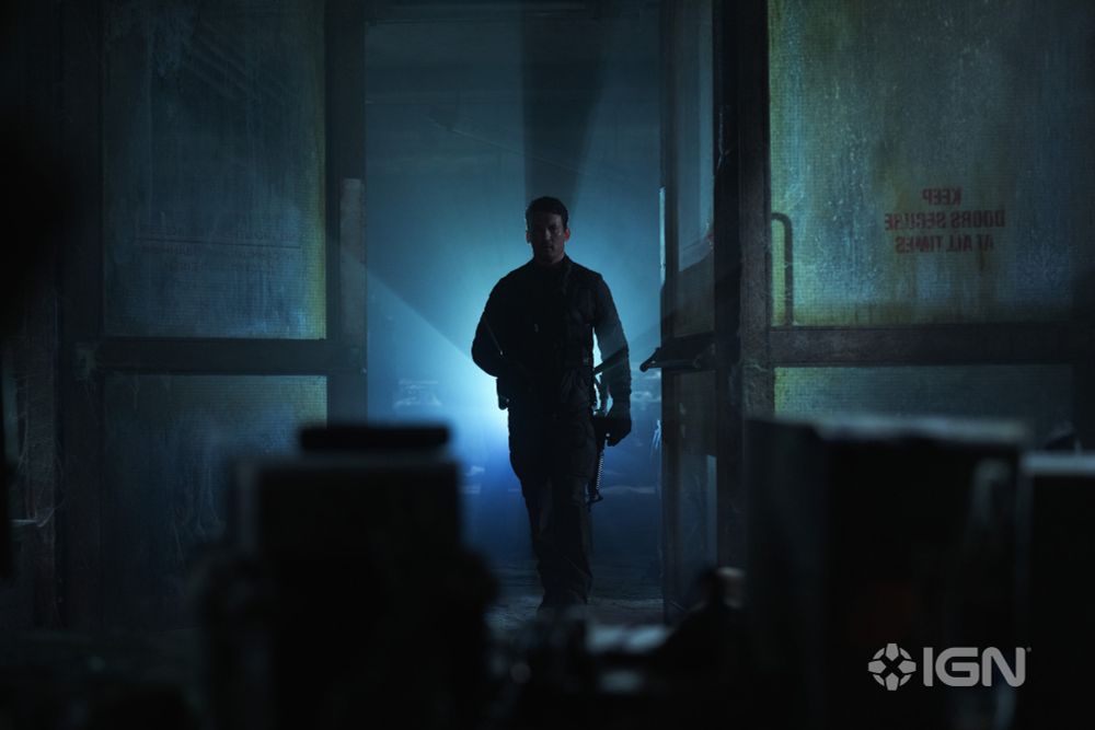 Miles Teller, dramatically backlit.