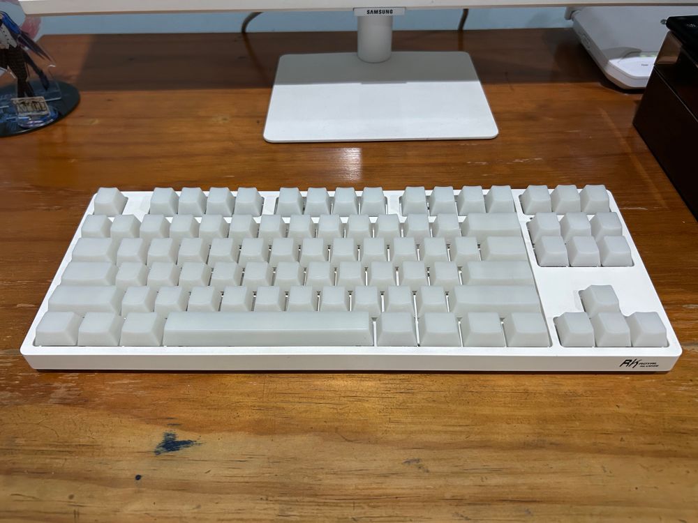 the keyboard on my desk with all-white jelly keycaps