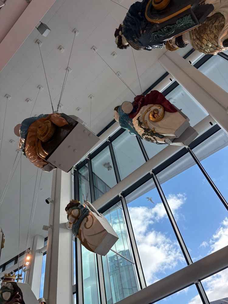 Looking up at figureheads in the Box Museum