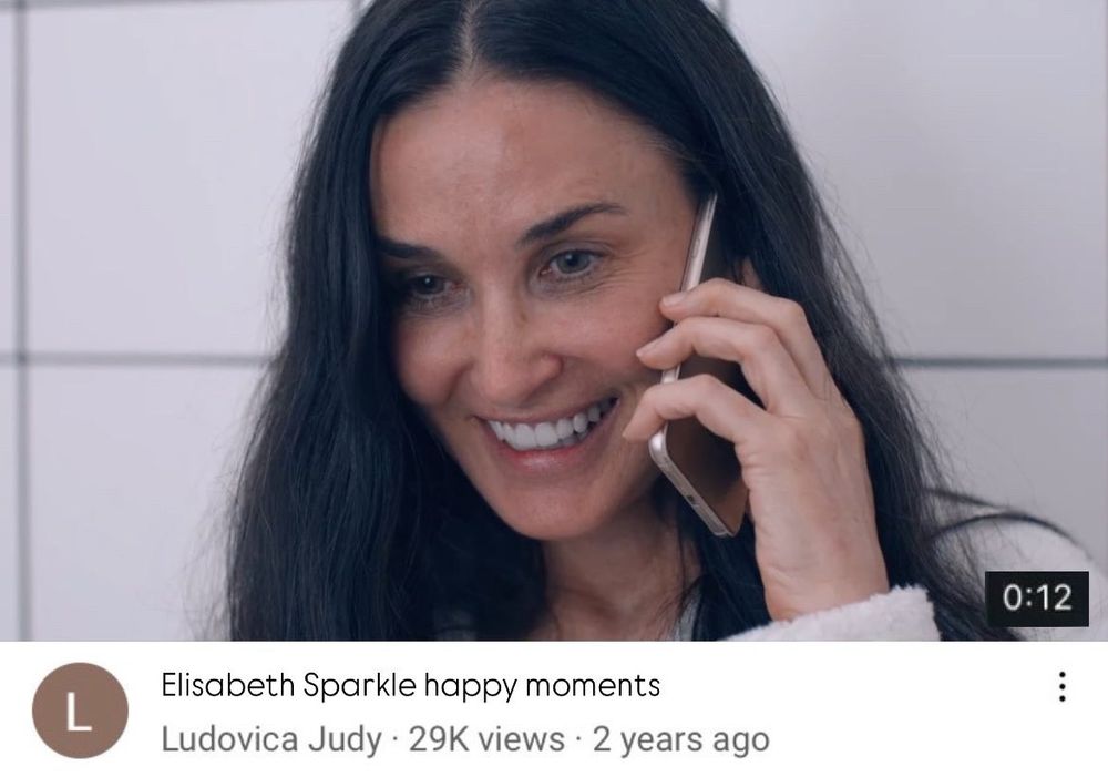 Screenshot de um vídeo com título "Elisabeth Sparkle happy moments". A duração do vídeo é de 12 segundos.