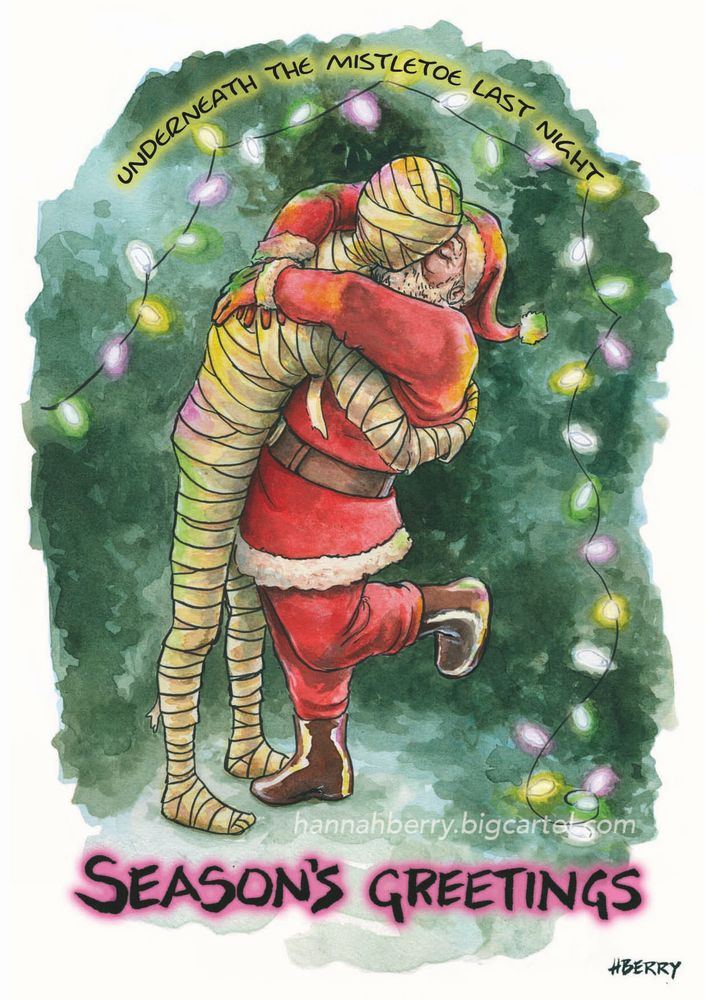 The phrase ‘underneath the mistletoe last night’, over a mummy (of the ancient Egyptian variety) kissing Santa Claus surrounded by Xmas lights. Underneath is written ‘seasons greetings’