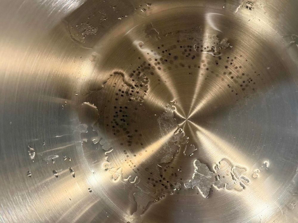 Dark spots and dark steel show heat damage