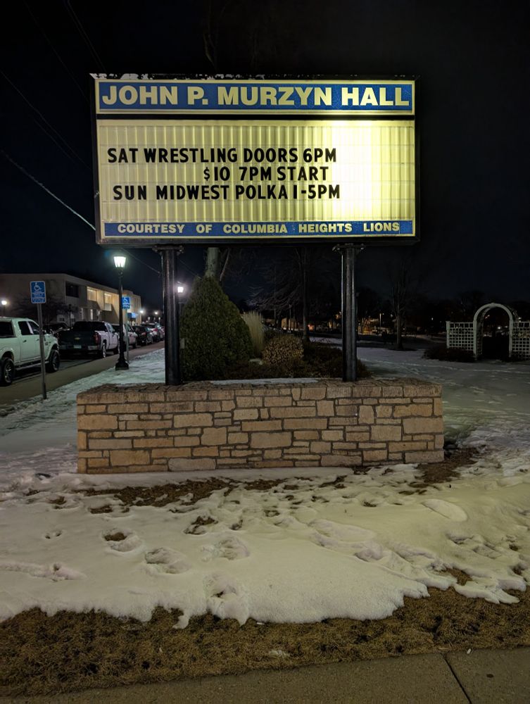 sign for john p murzyn hall with text reading

Sat wrestling
Sun Midwest polka 