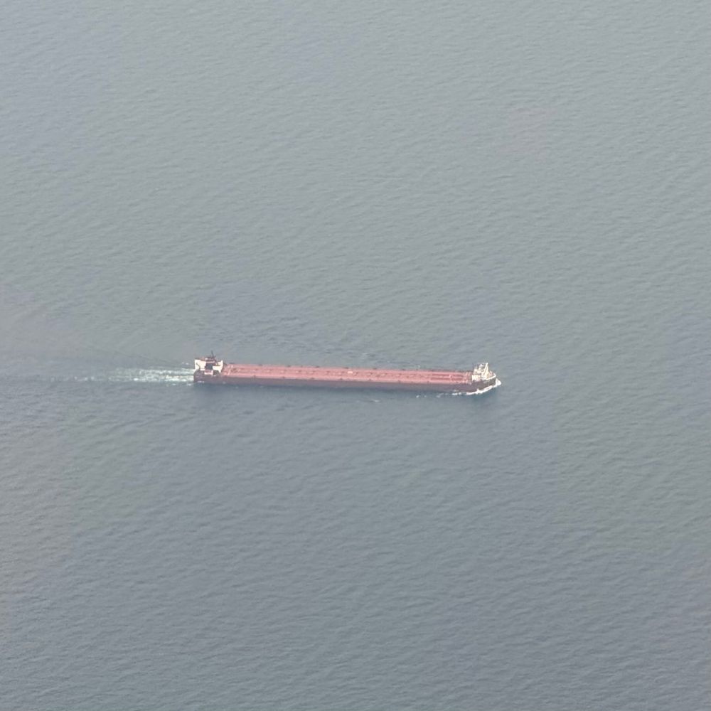 Photos of ore freighter in Lake Michigan taken from commercial airline passing over.