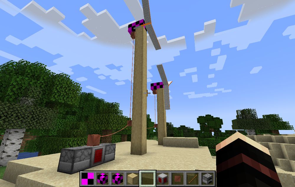 A screenshot of two Windmills and a Heater block in my Minecraft mod Vivatech