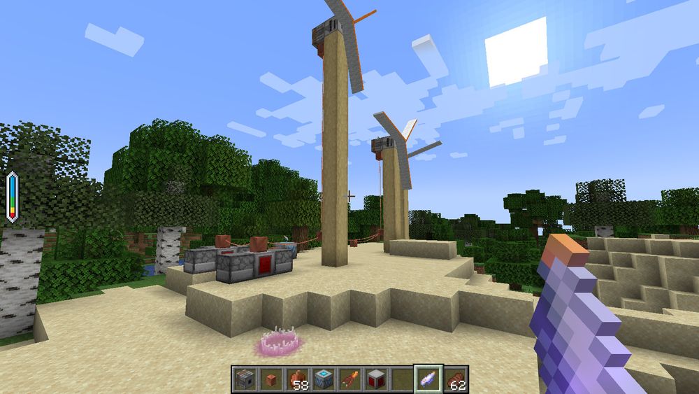 A screenshot of two Windmills, a couple of Heaters, a Charger and a Gadget in my hand demonstrating features of my Minecraft mod called Vivatech