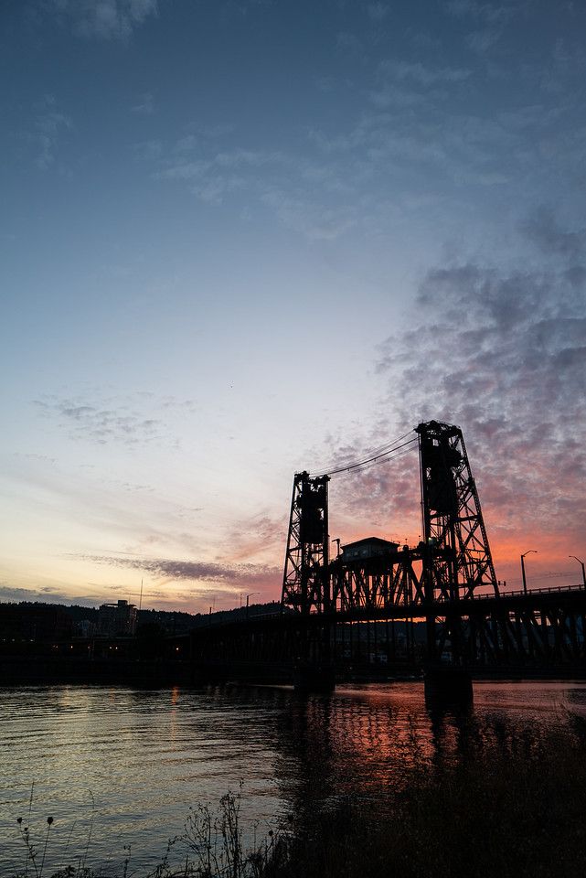 Vertical shot of the Steel Bridge with soft sunset colors