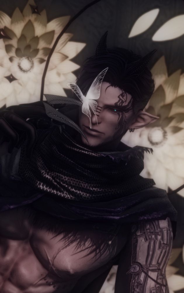 Xal infront of flowers, staring at a butterfly on the tip of his fi... claw? claw. Glove claw thingy.