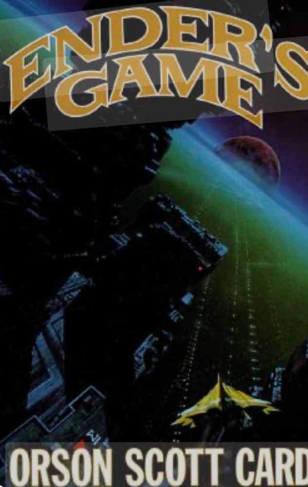Book cover of Enders Game by Orden Scott Card. A large spaceship is headed towards a red planet. 
