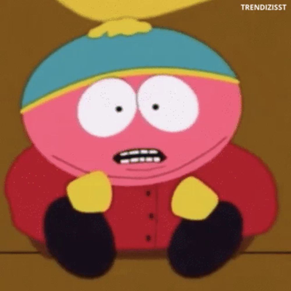 a cartoon character from south park is sitting on the floor and making a surprised face .
