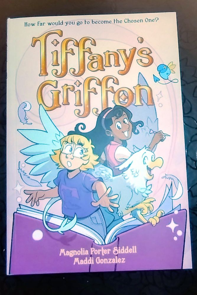 The front cover of Tiffany's Griffon by Magnolia Porter Siddell and Maddi Gonzalez on my dining table. 

Don't tell anyone I have it though, it's a Christmas present.