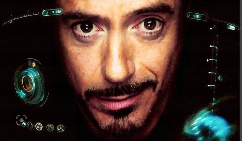 Photo of Iron Man smirking at the camera.