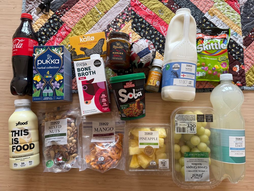 Lots of food laid on table. 