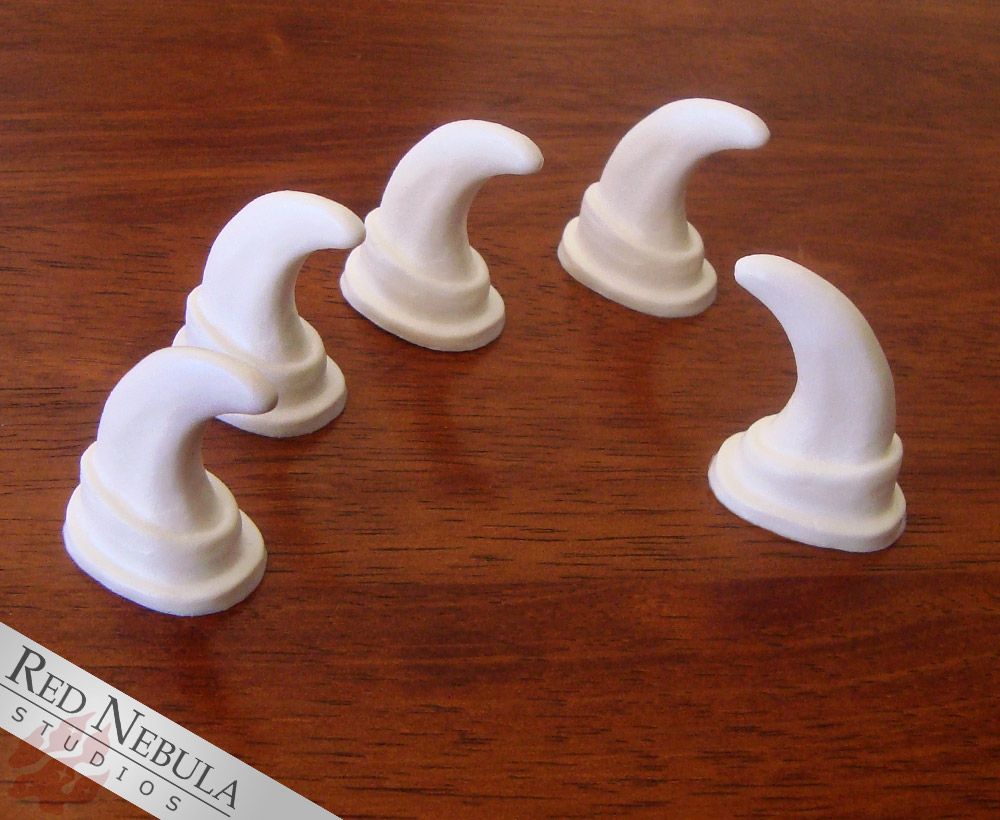 A set of white resin cast feline fursuit claws.