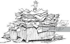 Hand sticking out from a pile of paperwork on desk. iStock image