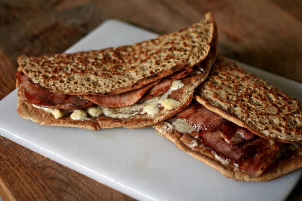A plate of Staffordshire oatcakes with cheese and bacon