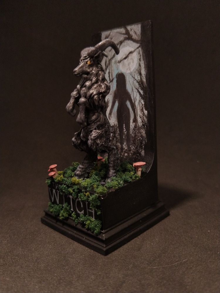 Painted miniature of Phillip the black goat. 