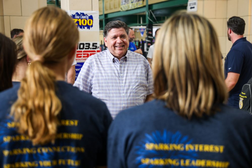 Governor Pritzker speaks to constituents.