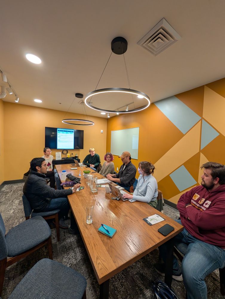 People around a meeting table