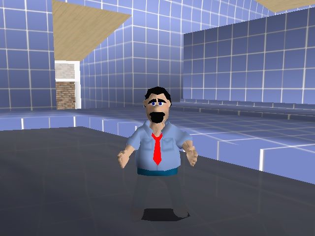 A white man stands waist deep in a pool of water. The floors and walls are covered in blue tiles. There is a staircase behind the man that leads to a lower floor of the building. The Man is wearing a light blue collared shirt, red tie, and blue jeans. He has black hair, blue eyes, and a mustache-beard combo.