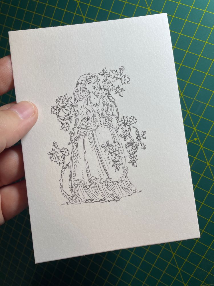 A woman with loose hair holding a dagger in the folds of her long skirt and with roses growing behind her