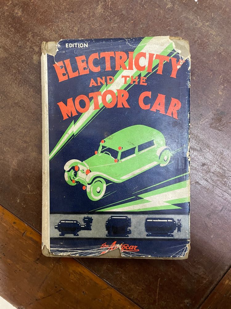 ELECTRICITY AND THE MOTOR CAR
Green, black, white and red, with jazzy car and lightning bolts