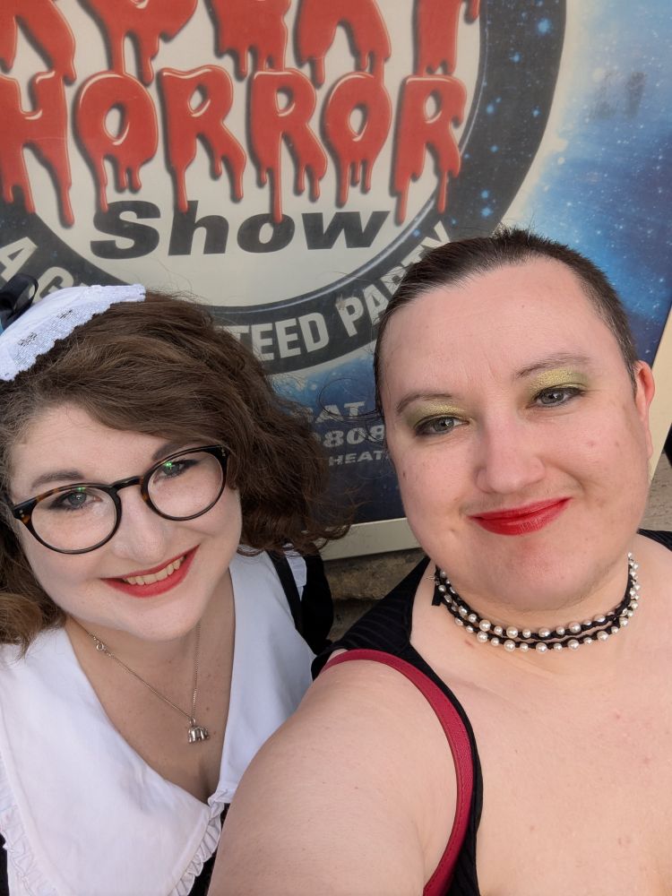 Friend dressed as Magenta, I am wearing too much makeup 