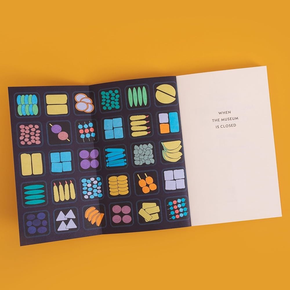 Endpapers look like a bento box with a black background and lots of colourful graphic foods.