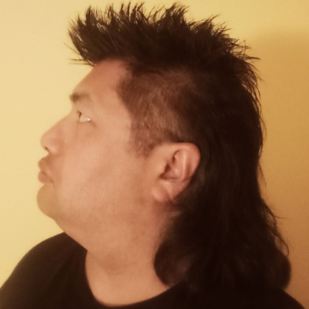 me clean shaven with a mullet looking left and slightly up
