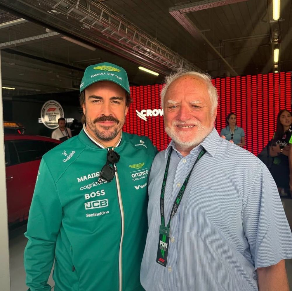 Formula 1 driver Fernando Alonso and 
András István Arató aka “Hide the Pain Harold”
