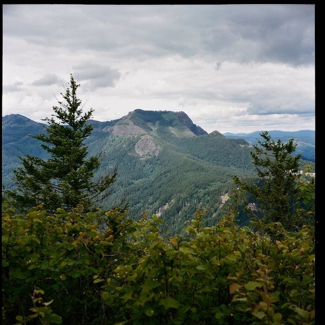 A view from one mountain peak looking to another one.