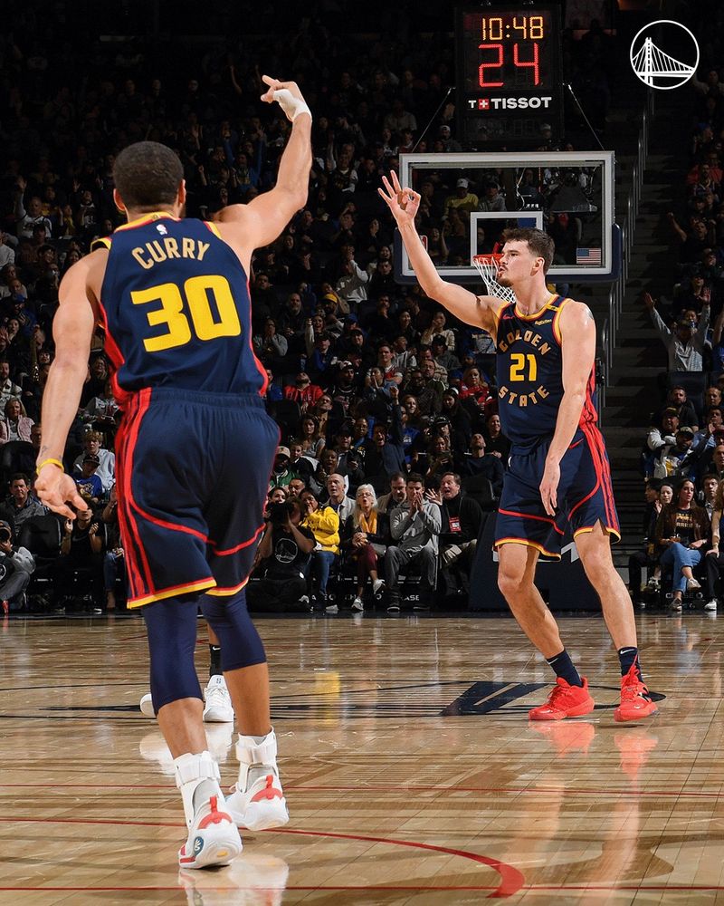 Warriors' legends and future hall of famers, Stephen Curry and Quinten Post celebrate after a 3-pointer. 