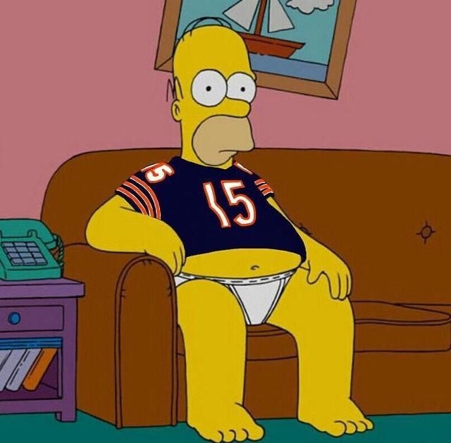 Homer Simpson on couch in Bears #15 jersey