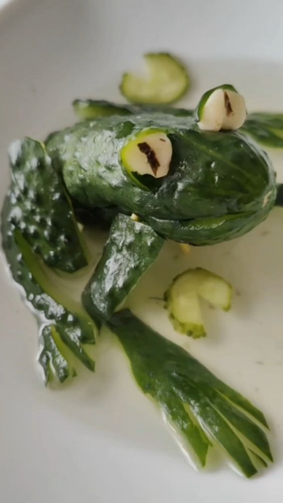a frog made out of pickles