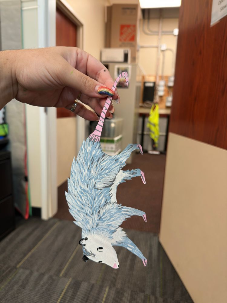 paper cutout of a possum