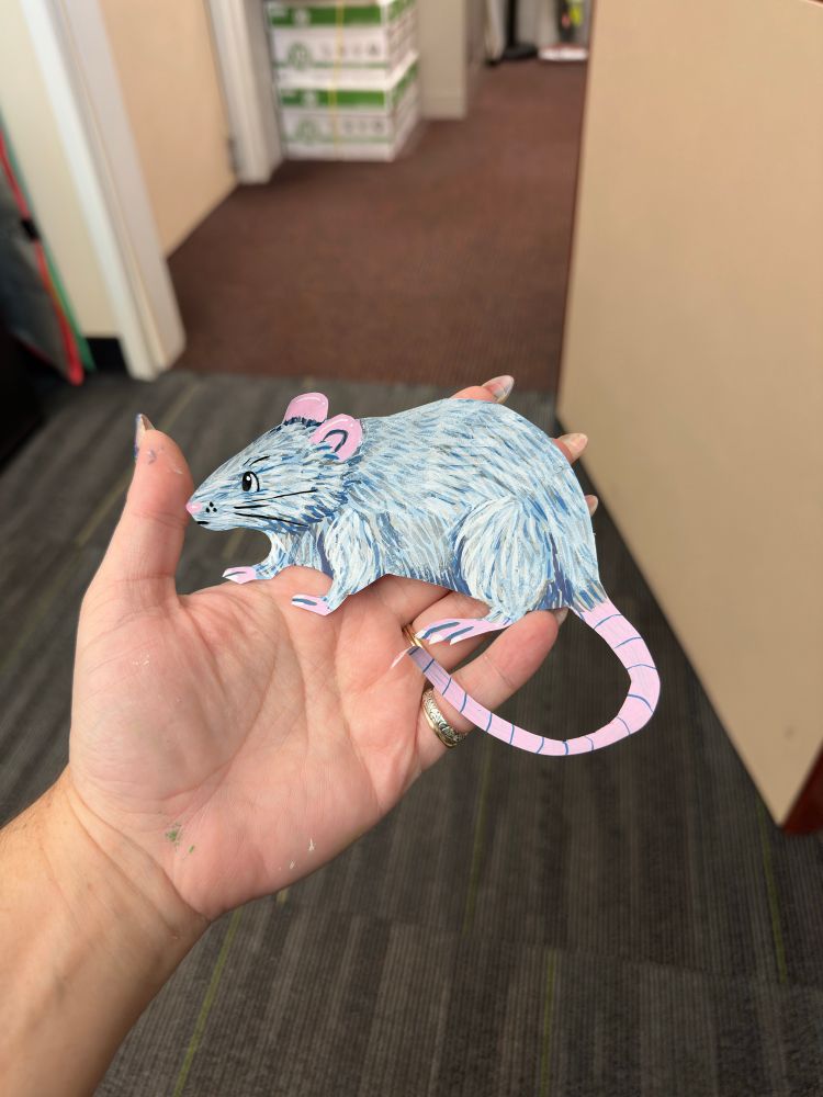 paper cutout of a rat