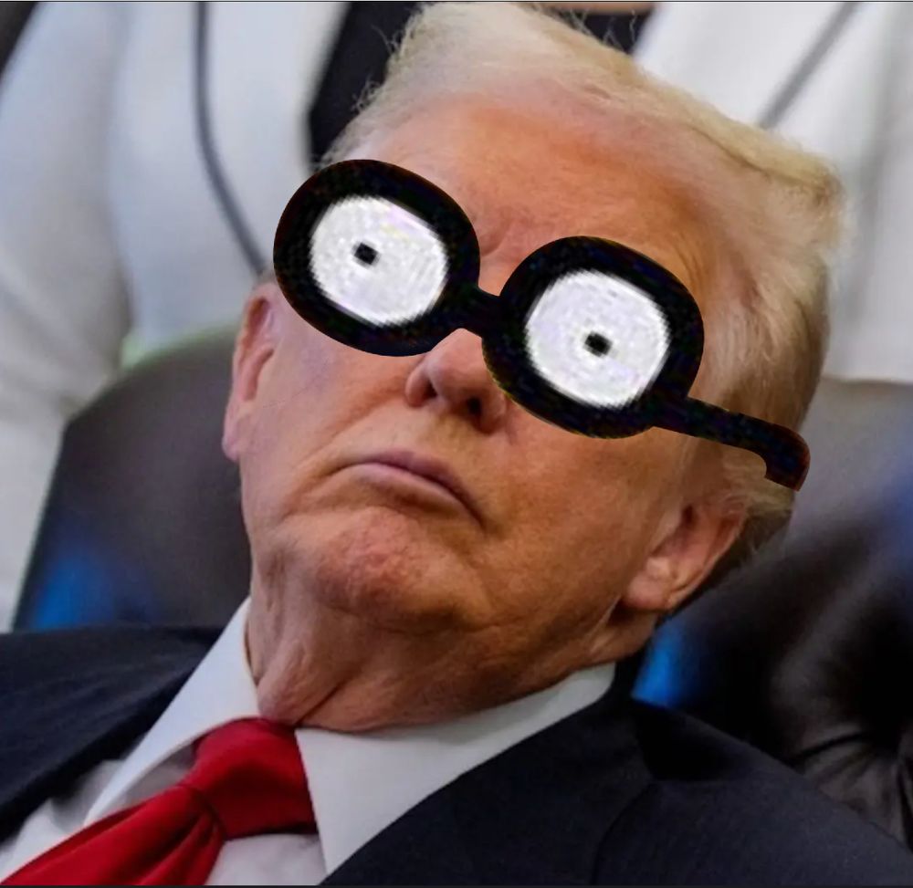 photo of Trump seemingly asleep during a press conference. the glasses that homer Simpson wore to appear awake while sleeping are photoshopped onto Trump's face. 