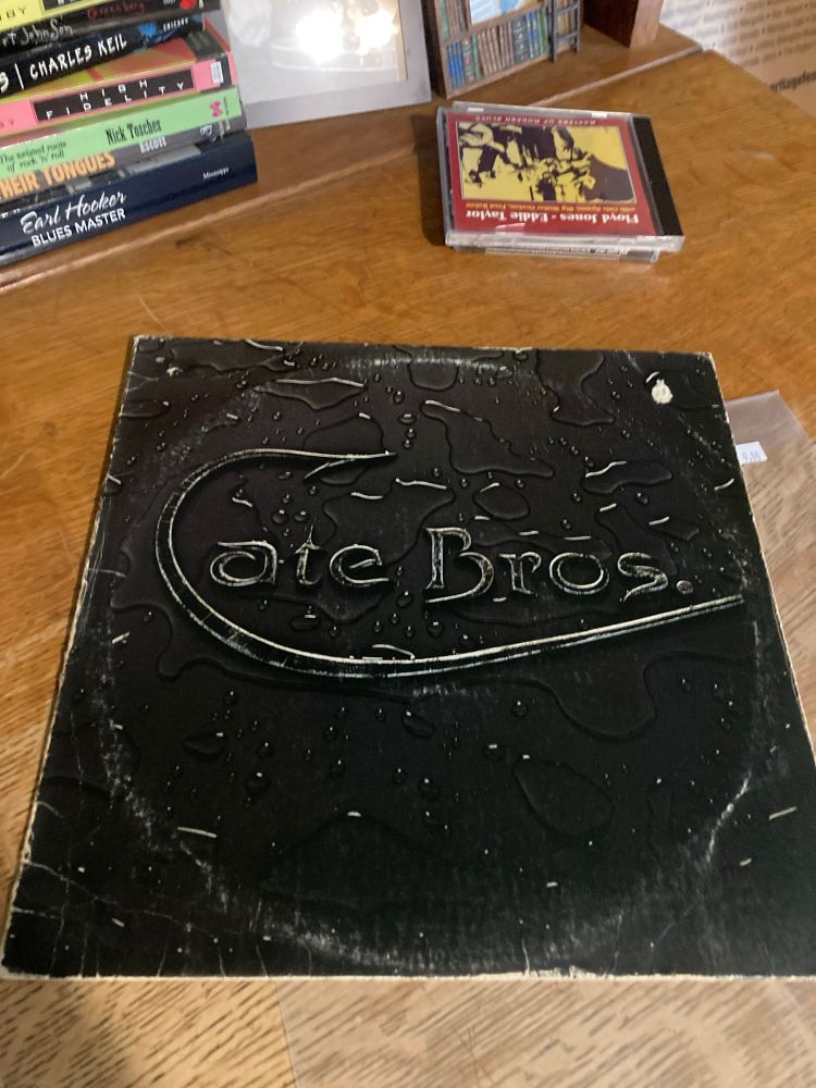 Cate Bros. record album. Their logo is a stylized fishhook for the “C”